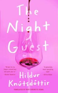 The novella The Night Guest features a pink cover with a wine glass on it. Something red -- wine? blood? -- drips into the glass.